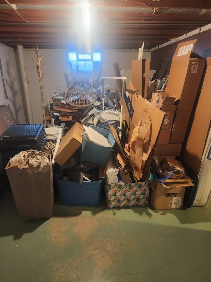 Roll-off dumpster container at job site for 2 Yard Dumpster Rental in Exeter